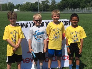 children at a track and field event